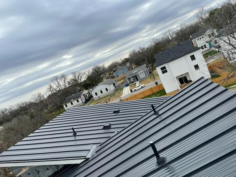 Standing seam metal roof panels with vents for Skylight Repair in East Providence